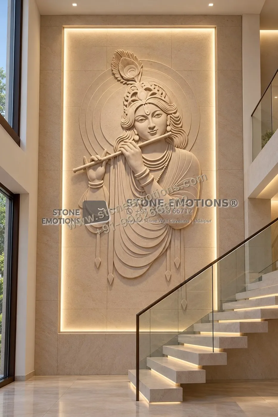Staircase wall with framed Krishna-with-flute relief and cove light