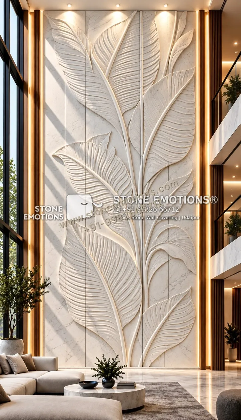 Double-height white wall with oversized banana/palm leaf relief across full height