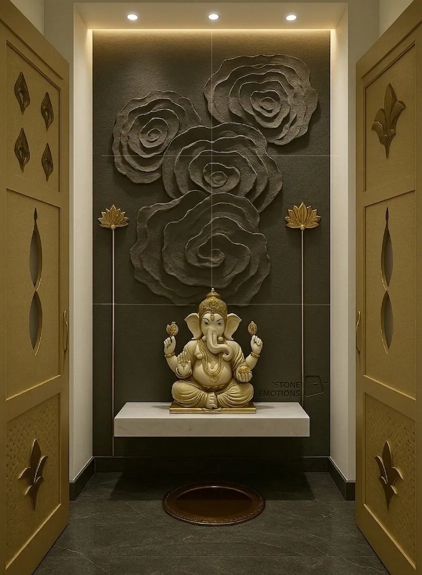 Dark mandir alcove with large rose reliefs above Ganesh