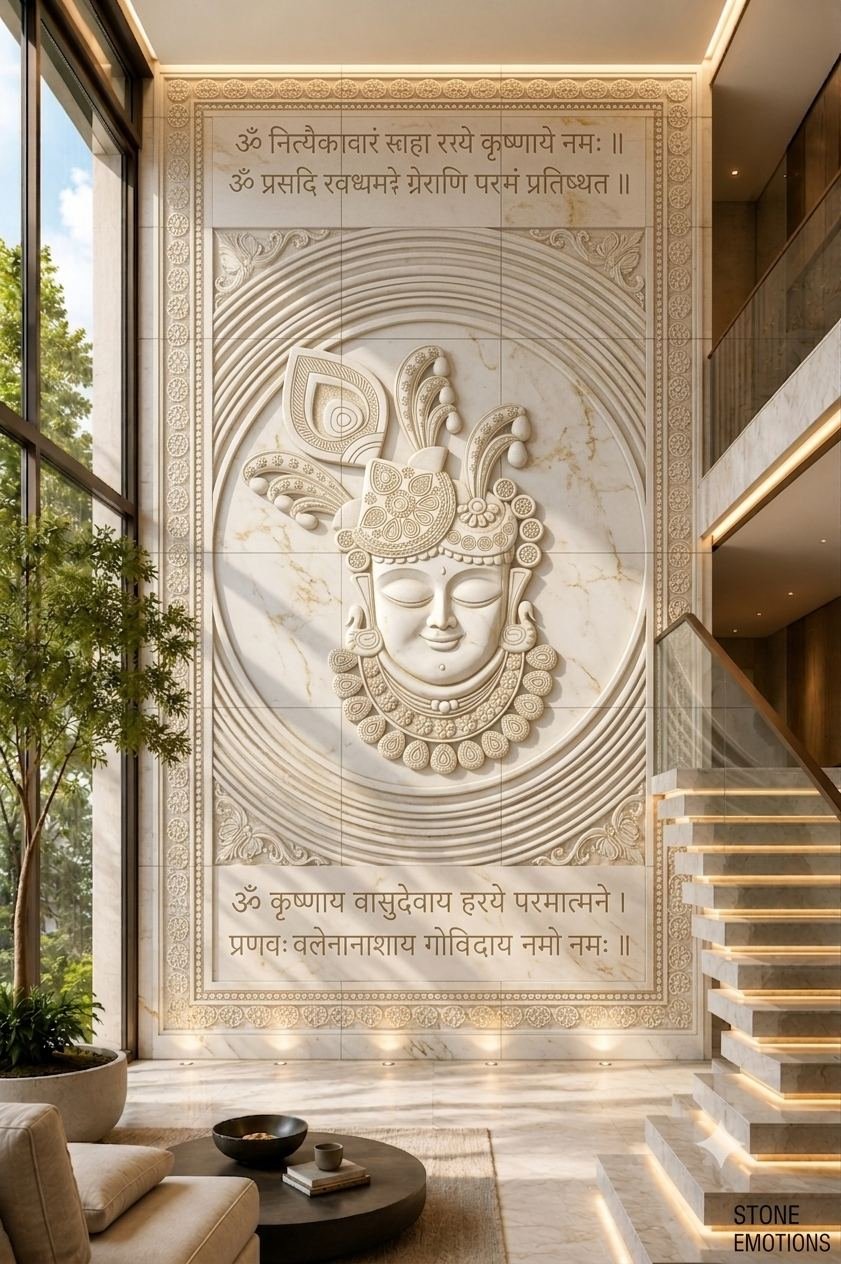 Large marble lobby feature wall with floral canopy and golden cow reliefs in a hospitality interior by Stone Emotions
